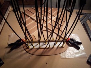 Another shot of gluing on the top braces.