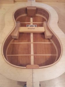 The back has been glued onto the side with the body still in the construction mold.
