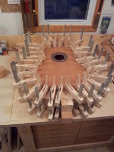 The top clamped while being glued onto the sides
