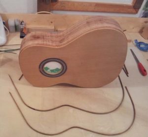 The binding strips bent to shape before gluing.