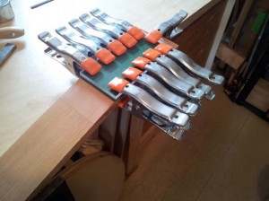 Gluing on the headstock veneer.