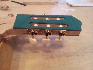 The headstock after the string slots have been completed.