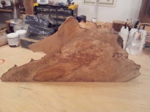 Maple burl wood. Pieces will be used for the rosette or decoration around the sound hole.