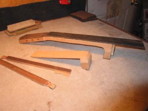 The excess pieces cut off before starting to carve the neck.